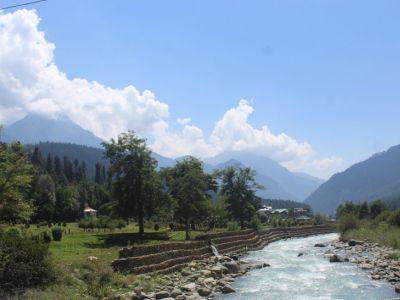 Kashmir valley river view with mountains and greenery in Srinagar