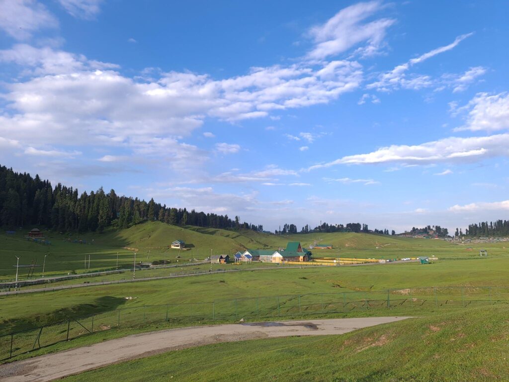 Gulmarg Gondola cable car ride over snow covered mountains in Gulmarg Kashmir.